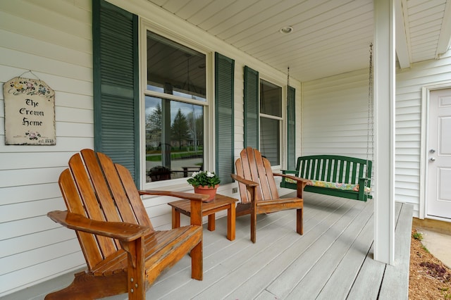 wooden deck featuring a porch