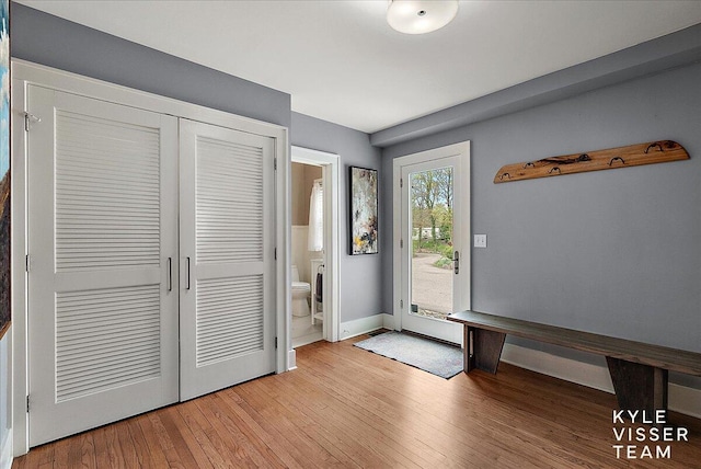 2630 Reeds Lake Ct SE, Grand Rapids, MI 49506 - entrance foyer featuring light wood-style floors and baseboards