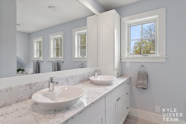 2630 Reeds Lake Ct SE, Grand Rapids, MI 49506 - full bathroom with double vanity