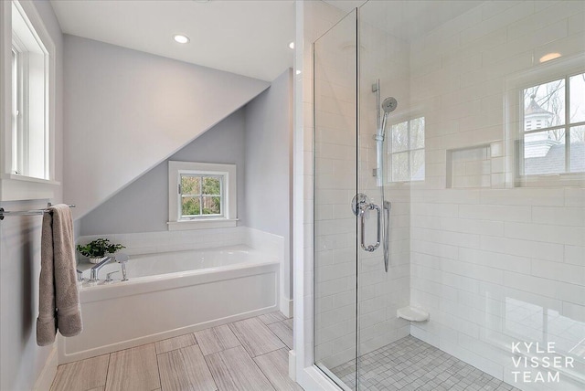 2630 Reeds Lake Ct SE, Grand Rapids, MI 49506 - full bathroom featuring a stall shower, a garden tub, and recessed lighting