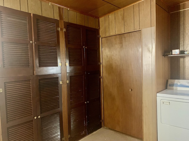 interior space with washer / dryer, wooden walls, and wooden ceiling