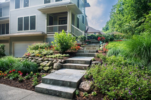 1614 Cambridge Rd, Ann Arbor, MI 48104 - entrance to property featuring a garage and covered porch