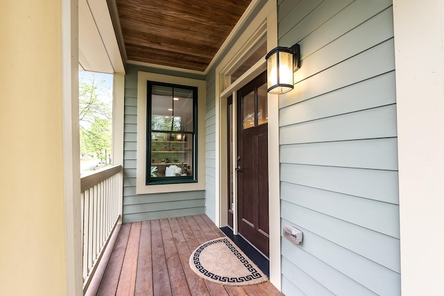 doorway to property featuring covered porch
