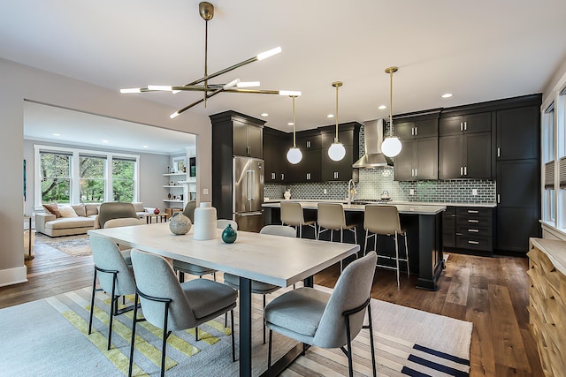 dining area featuring recessed lighting and dark wood-style floors