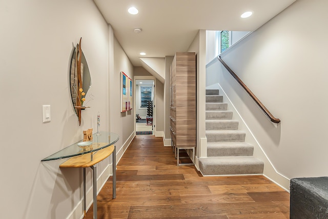 1614 Cambridge Rd, Ann Arbor, MI 48104 - hall with recessed lighting, baseboards, stairs, and wood finished floors