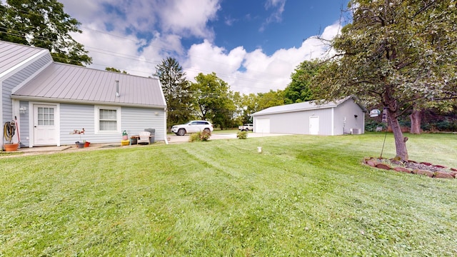 view of yard with a garage