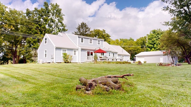 back of property with a yard