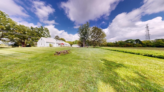 view of yard with a rural view