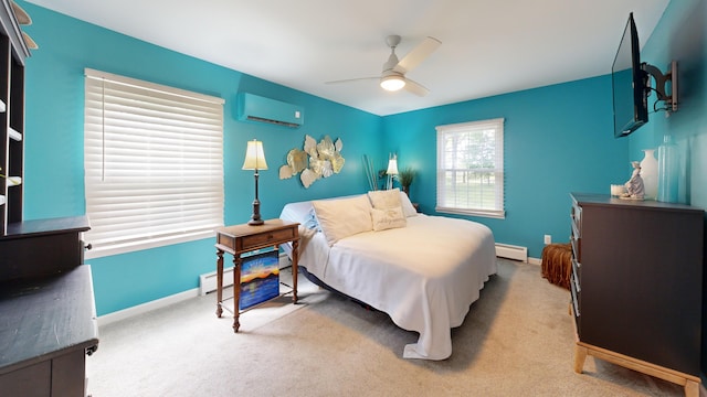 bedroom with baseboards, carpet flooring, a baseboard heating unit, and a wall unit AC