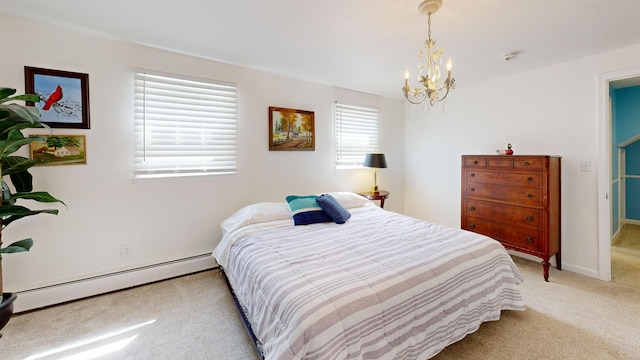 bedroom featuring light colored carpet, a baseboard heating unit, and an inviting chandelier