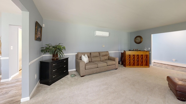 living room with baseboards, a wall unit AC, light carpet, and a baseboard radiator