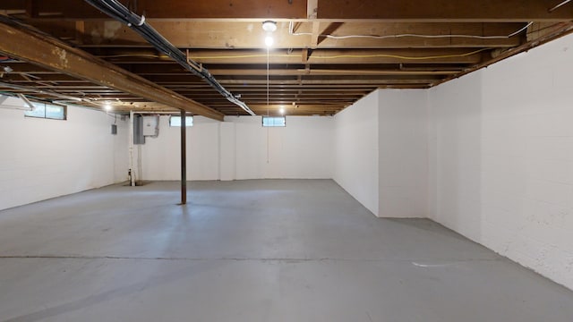 basement featuring concrete block wall