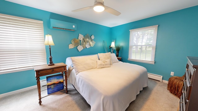 carpeted bedroom with baseboards, a ceiling fan, a wall mounted AC, and baseboard heating