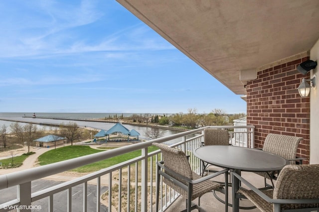 balcony featuring a water view