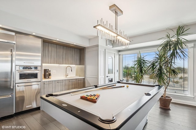 recreation room featuring a sink, billiards, recessed lighting, and dark wood-type flooring