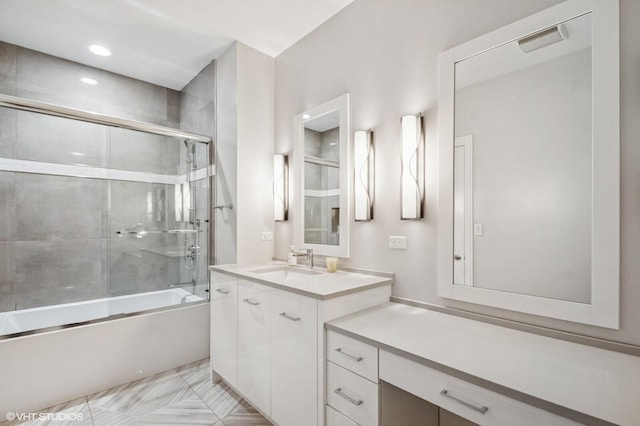 full bath with bath / shower combo with glass door and vanity