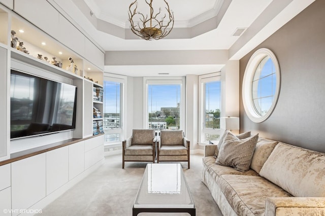 living area with light carpet, ornamental molding, and plenty of natural light