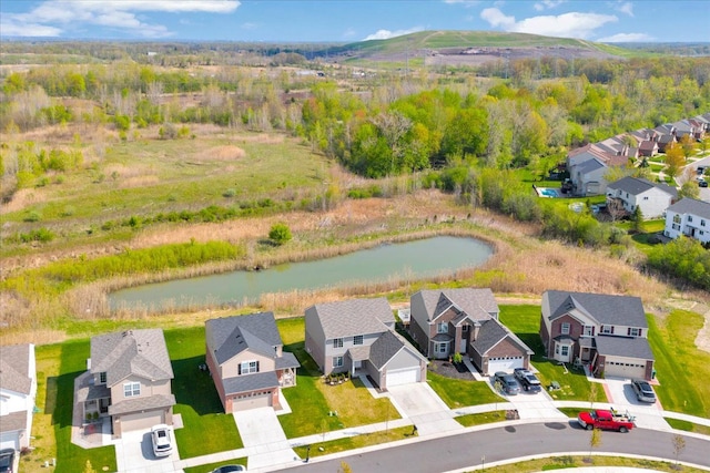 bird's eye view featuring a residential view and a water and mountain view