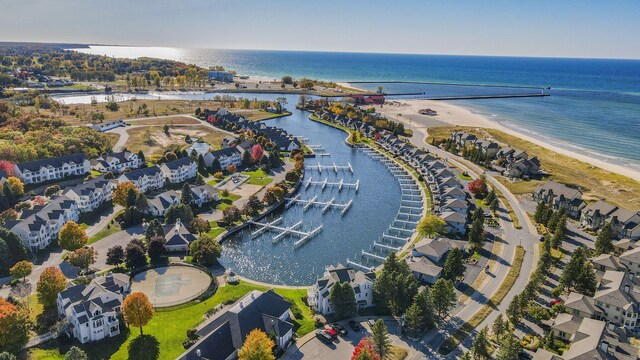 birds eye view of property featuring a water view