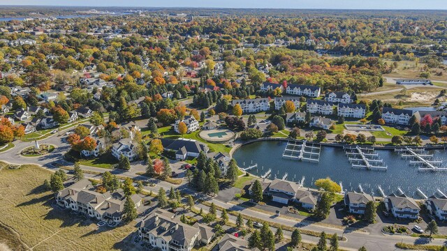 aerial view with a water view and a residential view
