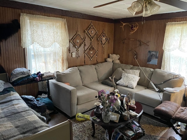16206 Peters Farm Rd, Irons, MI 49644 - living area with wood walls, ceiling fan, and wood finished floors