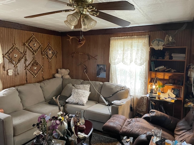 16206 Peters Farm Rd, Irons, MI 49644 - living room featuring wood walls and a ceiling fan