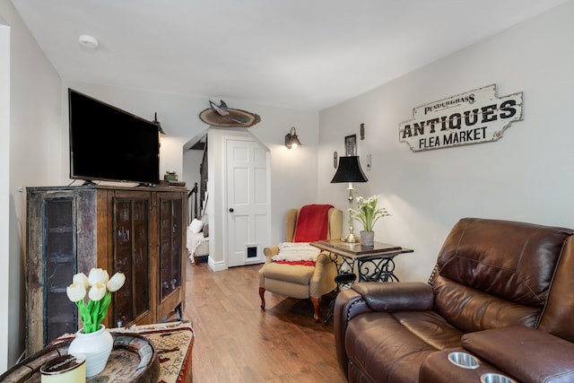 living area with wood finished floors
