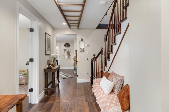 interior space with baseboards, wood-type flooring, recessed lighting, and stairs