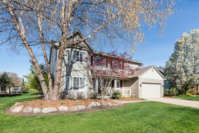 traditional-style home featuring covered porch, driveway, a front yard, brick siding, and an attached garage
