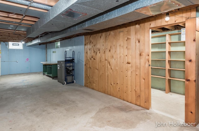 below grade area with wooden walls