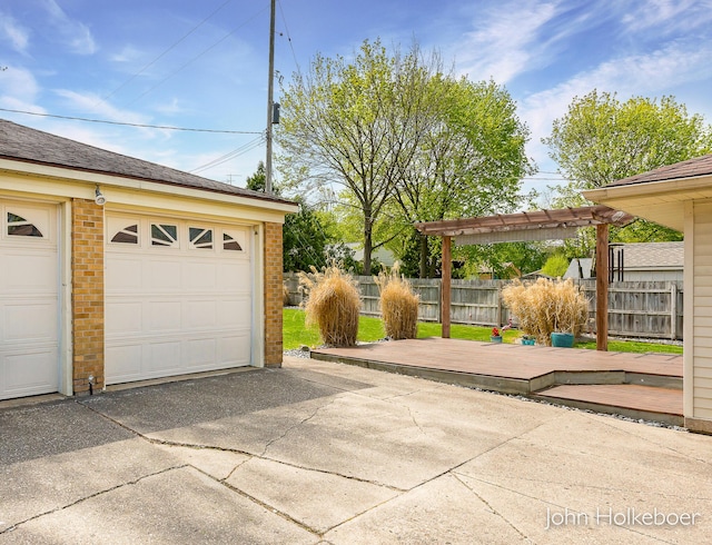 garage with fence