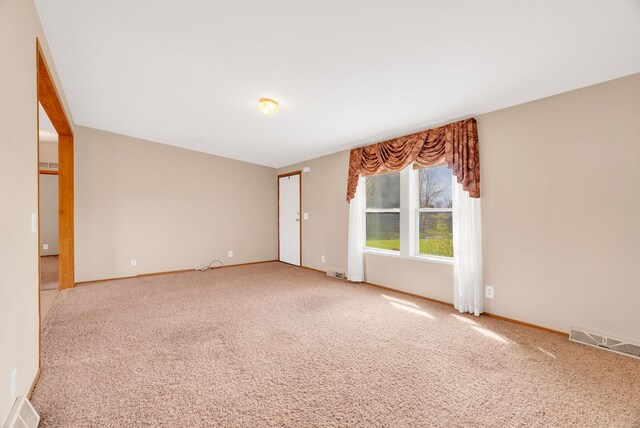 2326 Burnsline Rd, Brown City, MI 48416 - carpeted spare room with baseboards
