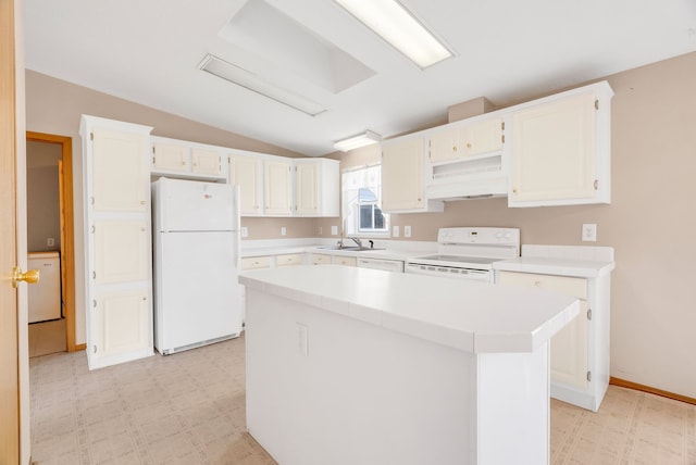 2326 Burnsline Rd, Brown City, MI 48416 - kitchen with white appliances, vaulted ceiling, light countertops, washer / clothes dryer, and a center island