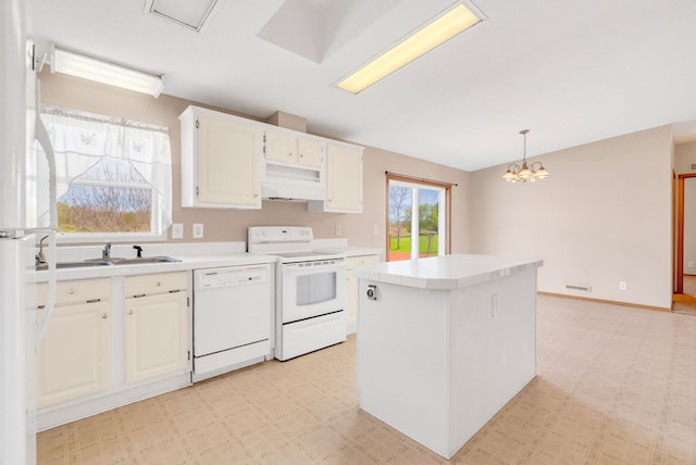 2326 Burnsline Rd, Brown City, MI 48416 - kitchen with white appliances, a sink, light floors, light countertops, and a chandelier