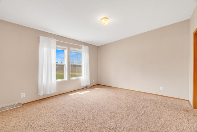 2326 Burnsline Rd, Brown City, MI 48416 - spare room featuring carpet flooring and baseboards