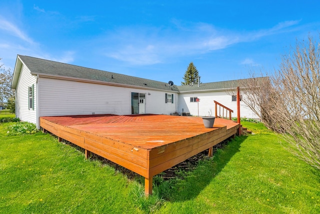 2326 Burnsline Rd, Brown City, MI 48416 - rear view of house with a wooden deck and a yard