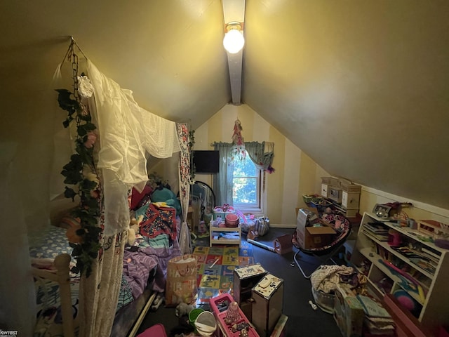 bedroom with lofted ceiling with beams