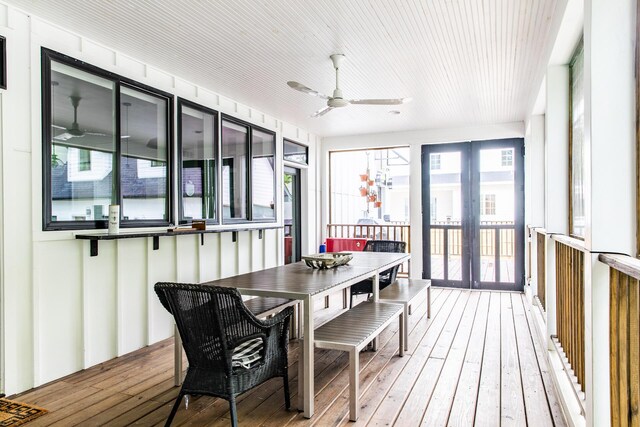 sunroom featuring french doors