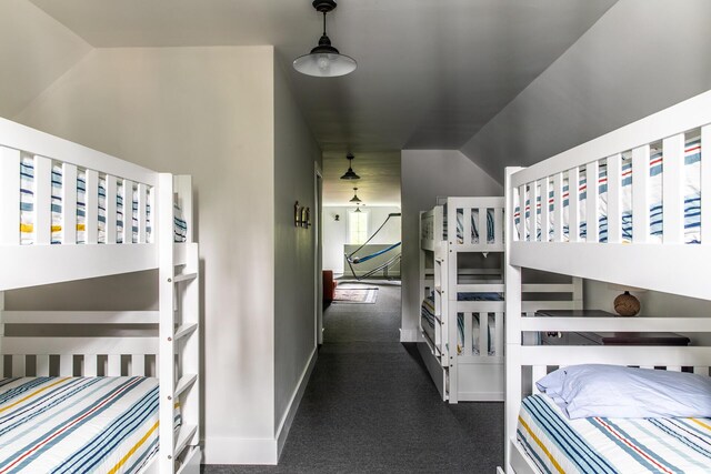 carpeted bedroom with baseboards
