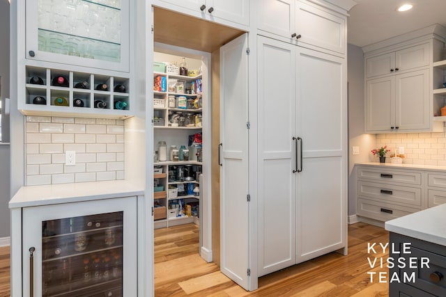 pantry featuring beverage cooler