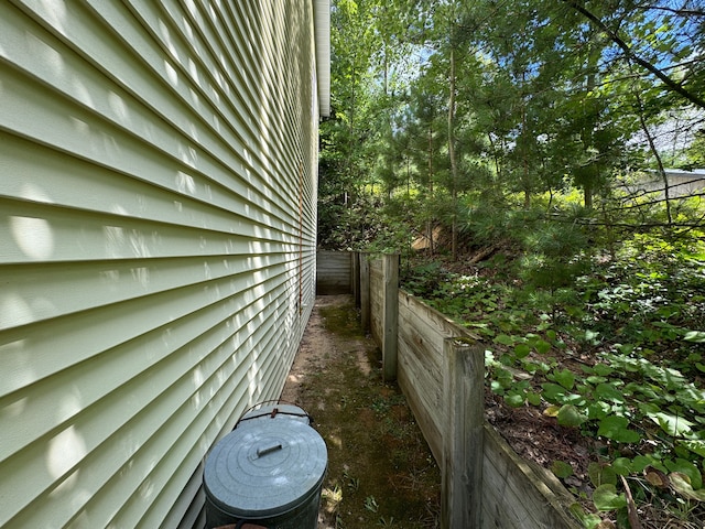 5940 Oak Rd, Rose City, MI 48654 - view of side of home featuring fence