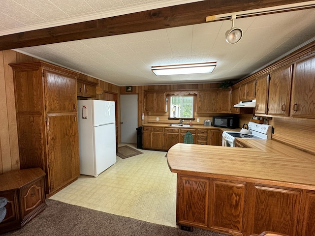 5940 Oak Rd, Rose City, MI 48654 - kitchen with a peninsula, a sink, white appliances, under cabinet range hood, and light countertops