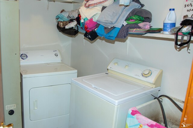 laundry area featuring laundry area and washing machine and clothes dryer