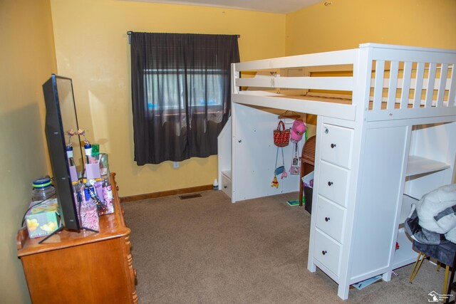 carpeted bedroom with visible vents