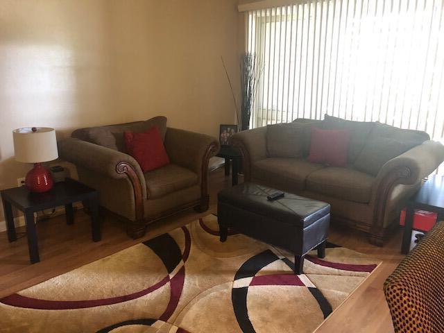 living room with wood finished floors