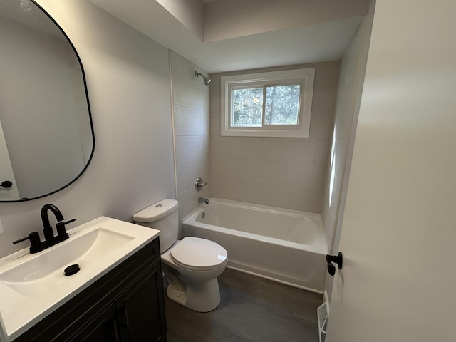 6735 Bayview Dr, Coloma, MI 49038 - bathroom featuring toilet, shower / washtub combination, and vanity