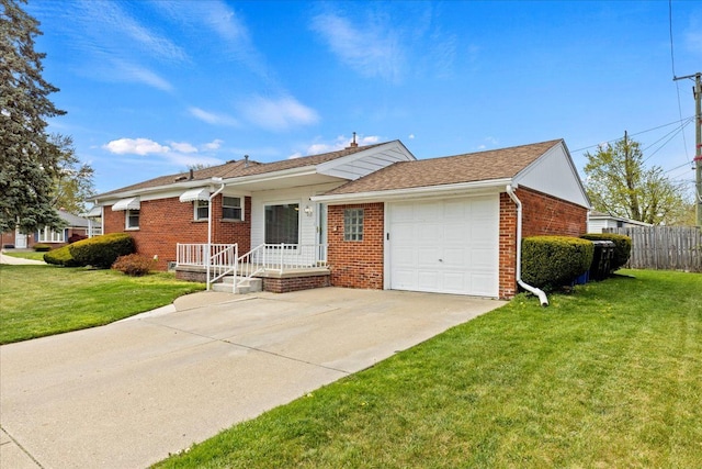 ranch-style house featuring a garage, driveway, a front lawn, and brick siding