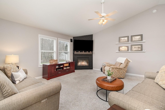 9959 Dice Rd, Freeland, MI 48623 - living area featuring a large fireplace, ceiling fan, baseboards, and vaulted ceiling