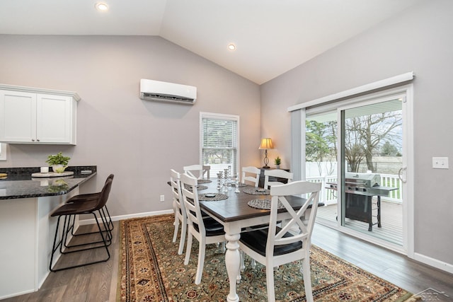 dining space with high vaulted ceiling, recessed lighting, baseboards, wood finished floors, and a wall mounted AC