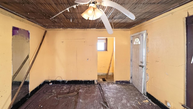 interior space featuring a ceiling fan and wood ceiling